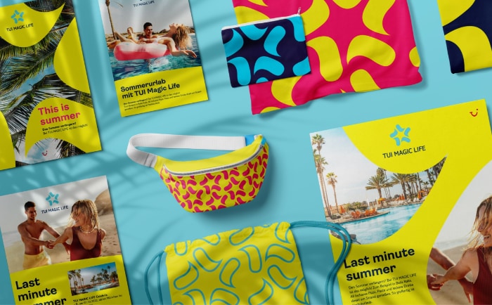 Farben "Sun", "Pool", "Midnight Blue" und "Flamingo" dominieren den neuen Markenauftritt. &copy; TUI