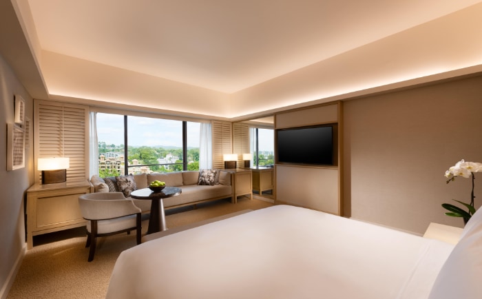 Zimmer im legendären Orchard Hotel in Singapur. &copy; 2023 Hilton
